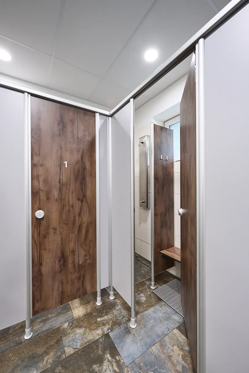 Shower dividing walls and shower cubicles